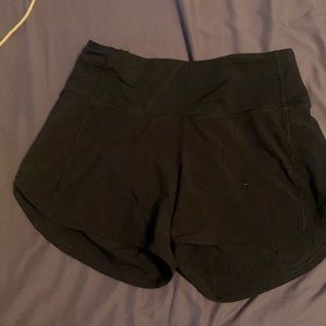 Size 0 lululemon black tracker shorts.Great condition.